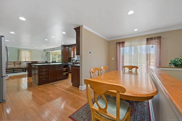 15 Oakledge Cir, Norwalk, CT 06854 - dining area with crown molding, recessed lighting, and light wood finished floors