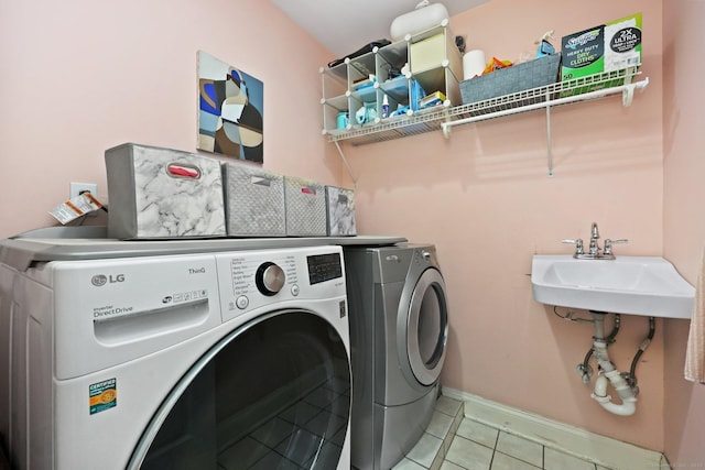 15 Oakledge Cir, Norwalk, CT 06854 - washroom with separate washer and dryer and light tile patterned floors
