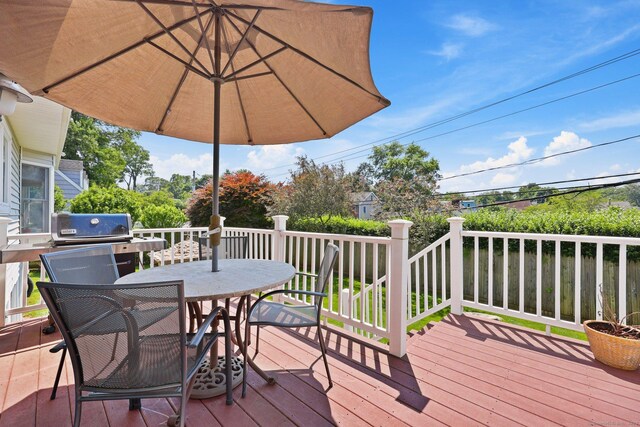 15 Oakledge Cir, Norwalk, CT 06854 - wooden terrace with outdoor dining area