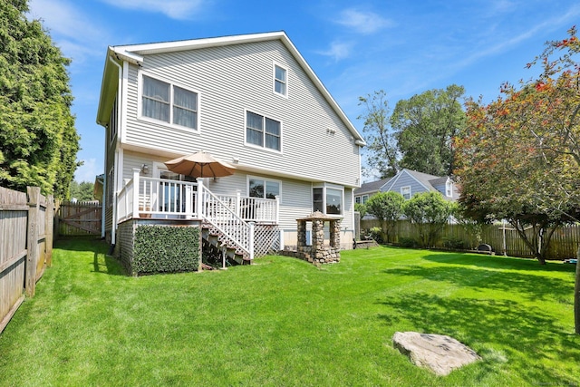 15 Oakledge Cir, Norwalk, CT 06854 - rear view of property with a fenced backyard, a deck, and stairs