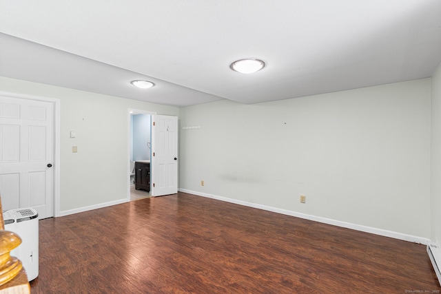 201 Baxter Rd Apt D, Mansfield, CT 06268 - empty room featuring wood finished floors, baseboards, and baseboard heating