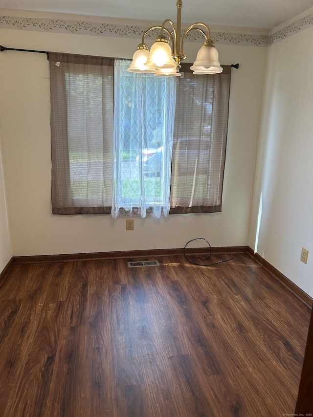 376 Cypress Rd Unit 376, Newington, CT 06111 - spare room featuring wood finished floors and a chandelier
