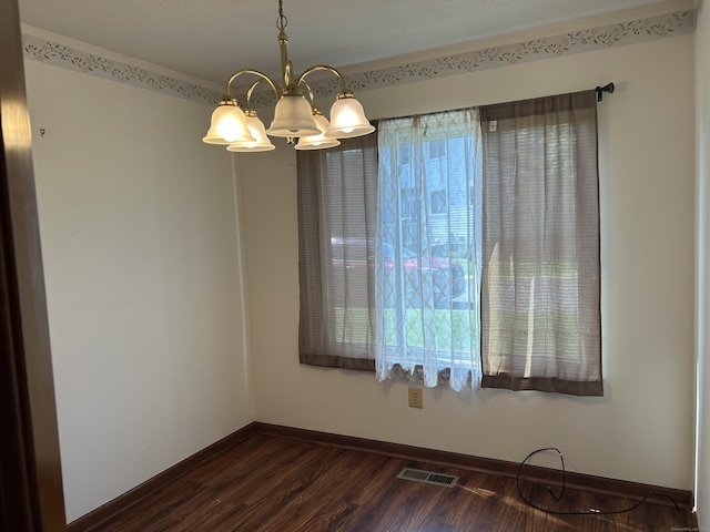 376 Cypress Rd Unit 376, Newington, CT 06111 - unfurnished room with a chandelier and dark wood-style flooring
