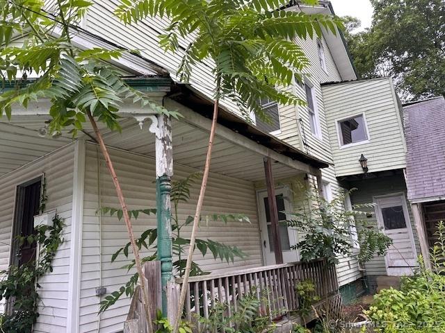 29 Division St, Norwich, CT 06360 - view of side of home with a porch