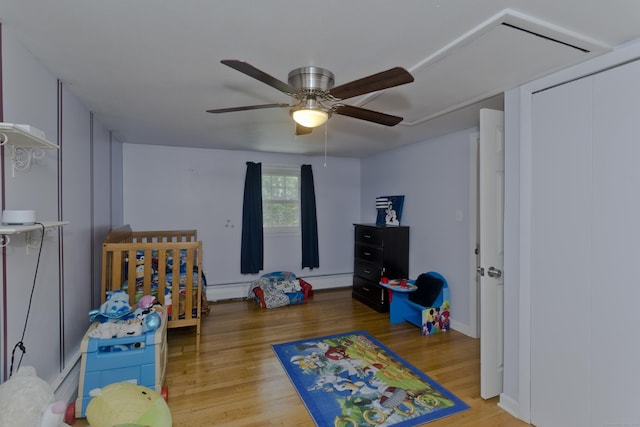 309 S Elm St, Windsor Locks, CT 06096 - bedroom featuring wood finished floors and ceiling fan