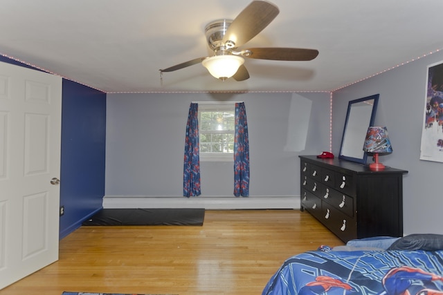 309 S Elm St, Windsor Locks, CT 06096 - bedroom with wood finished floors, baseboards, and ceiling fan