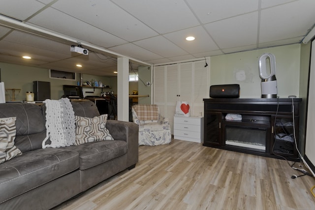 309 S Elm St, Windsor Locks, CT 06096 - living area featuring a paneled ceiling, wood finished floors, and recessed lighting