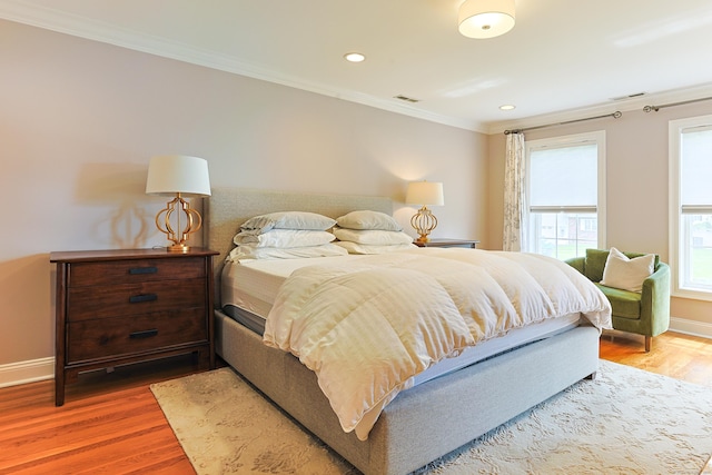 402 Jones Hill Rd, West Haven, CT 06516 - bedroom with crown molding, wood finished floors, and recessed lighting