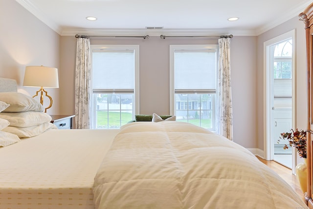 402 Jones Hill Rd, West Haven, CT 06516 - bedroom with multiple windows, crown molding, recessed lighting, and wood finished floors