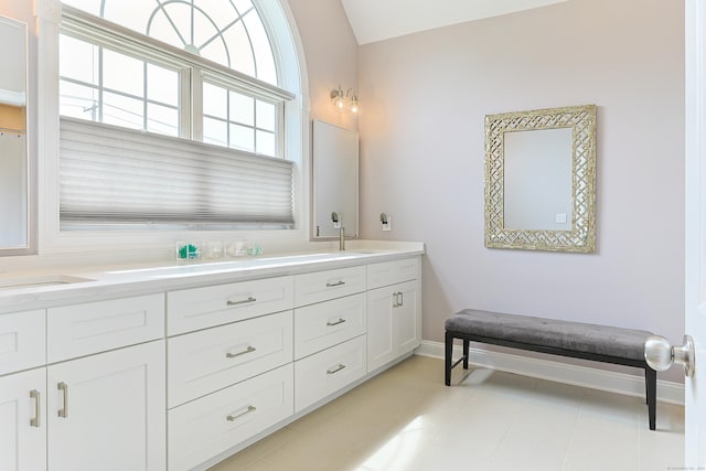 402 Jones Hill Rd, West Haven, CT 06516 - full bath featuring double vanity and baseboards
