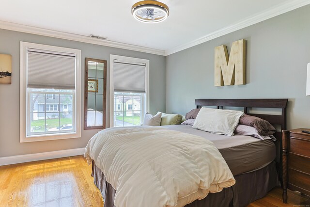 402 Jones Hill Rd, West Haven, CT 06516 - bedroom featuring ornamental molding and wood finished floors