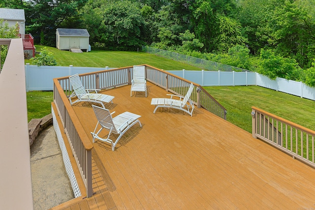 402 Jones Hill Rd, West Haven, CT 06516 - deck featuring a storage shed and a fenced backyard
