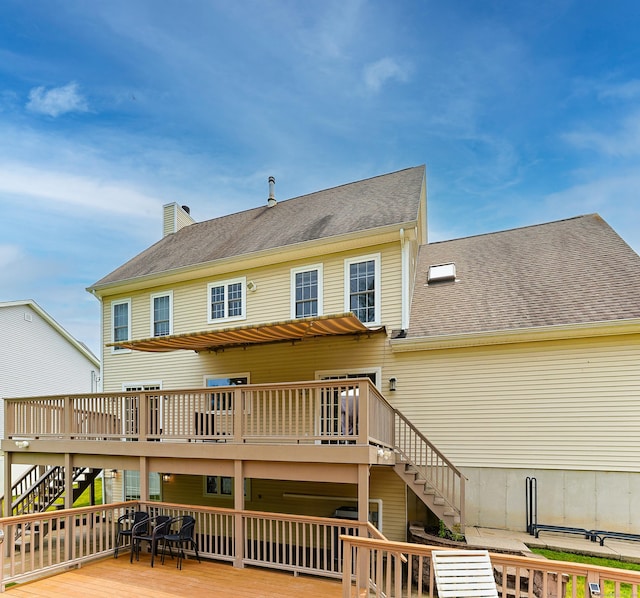 402 Jones Hill Rd, West Haven, CT 06516 - rear view of property featuring stairs, a wooden deck, and roof with shingles