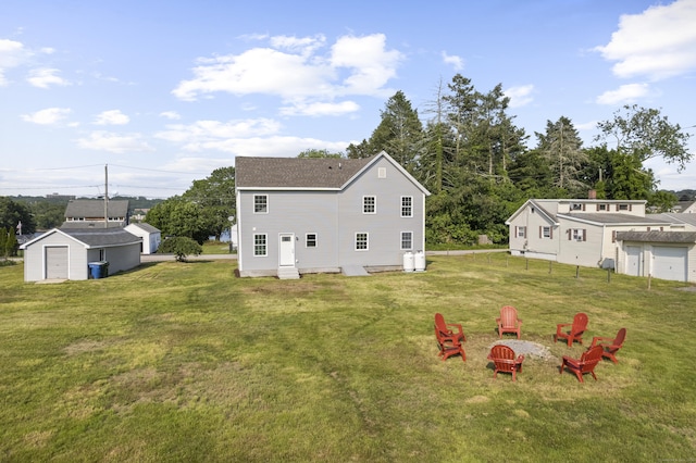 8 Wilson Ave, Waterford, CT 06375 - back of property featuring a fire pit and a lawn