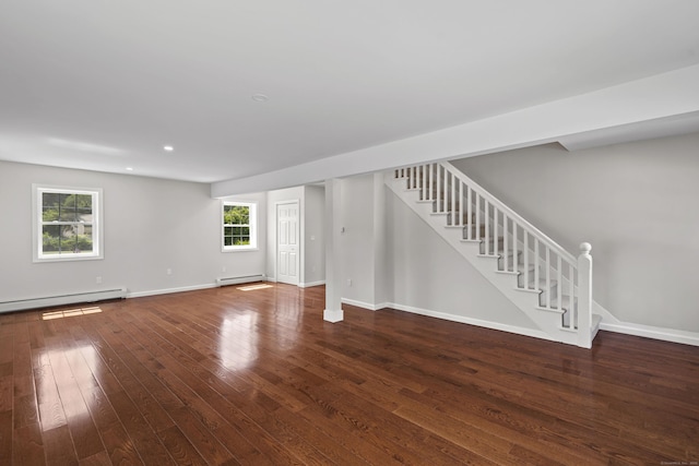 8 Wilson Ave, Waterford, CT 06375 - unfurnished living room featuring baseboard heating, stairs, a baseboard radiator, hardwood / wood-style floors, and baseboards