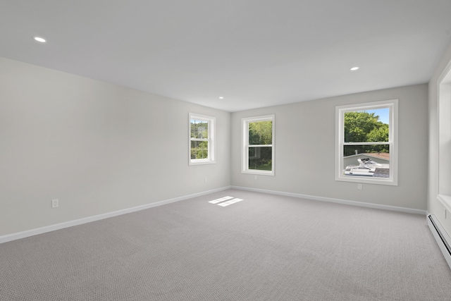 8 Wilson Ave, Waterford, CT 06375 - unfurnished room featuring light colored carpet, a baseboard radiator, plenty of natural light, and recessed lighting