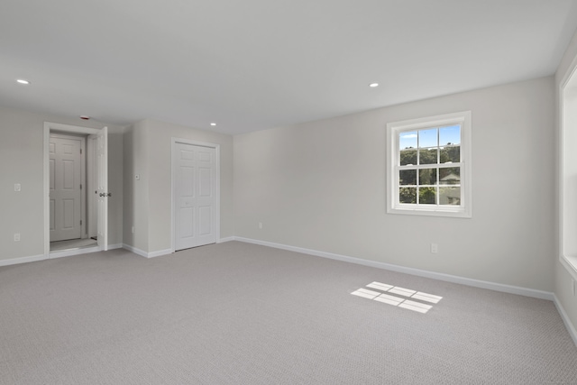 8 Wilson Ave, Waterford, CT 06375 - spare room with light carpet, baseboards, and recessed lighting
