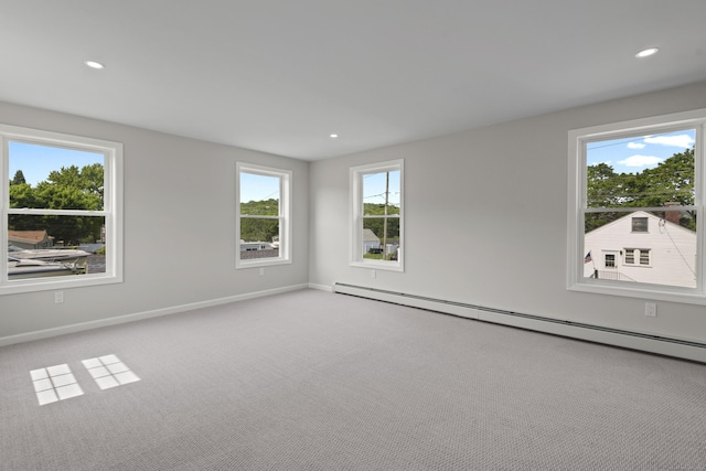 8 Wilson Ave, Waterford, CT 06375 - carpeted empty room featuring baseboard heating, baseboards, and recessed lighting