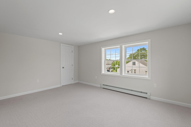 8 Wilson Ave, Waterford, CT 06375 - unfurnished room featuring a baseboard heating unit, light carpet, recessed lighting, and baseboards