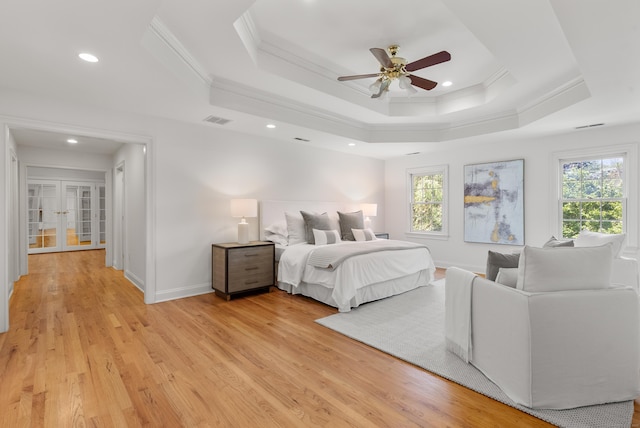 35 Hunting Ridge Rd, Easton, CT 06612 - bedroom featuring ornamental molding, a tray ceiling, light wood-style flooring, recessed lighting, and baseboards