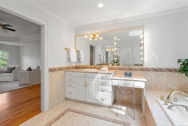 35 Hunting Ridge Rd, Easton, CT 06612 - bathroom featuring vanity, tile walls, a garden tub, ornamental molding, and a chandelier