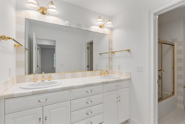 35 Hunting Ridge Rd, Easton, CT 06612 - bathroom with double vanity, bath / shower combo with glass door, and tile patterned floors