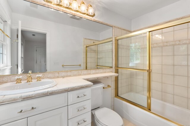 35 Hunting Ridge Rd, Easton, CT 06612 - full bathroom featuring vanity, toilet, and bath / shower combo with glass door