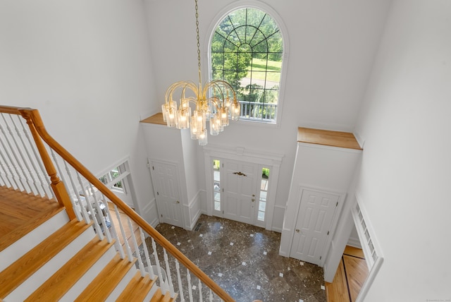35 Hunting Ridge Rd, Easton, CT 06612 - entrance foyer featuring a towering ceiling, a chandelier, plenty of natural light, and stairway