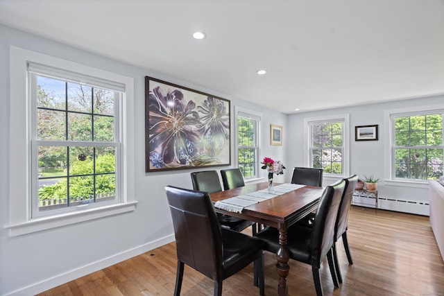 104 Quaker Farm Rd, Groton, CT 06355 - dining room featuring baseboard heating, wood finished floors, recessed lighting, and baseboards