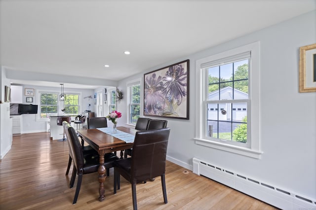 104 Quaker Farm Rd, Groton, CT 06355 - dining space with a baseboard heating unit, wood finished floors, baseboards, and recessed lighting