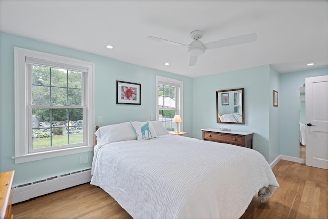 104 Quaker Farm Rd, Groton, CT 06355 - bedroom featuring a baseboard heating unit, light wood-style floors, recessed lighting, baseboards, and a ceiling fan