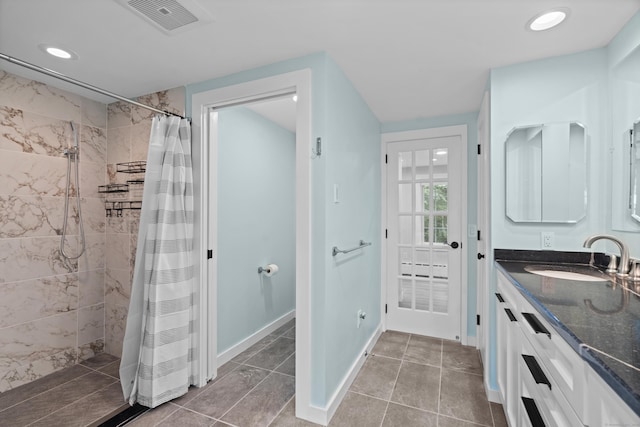 104 Quaker Farm Rd, Groton, CT 06355 - full bath with tiled shower, vanity, tile patterned floors, baseboards, and recessed lighting