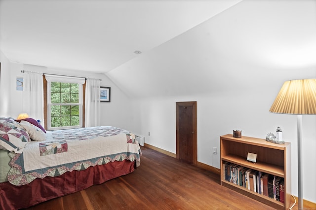104 Quaker Farm Rd, Groton, CT 06355 - bedroom featuring wood finished floors, vaulted ceiling, baseboards, and a baseboard radiator