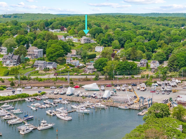 70 Prospect Hill Rd, Groton, CT 06340 - drone / aerial view of numerous boat docks, a heavily wooded area, and a nearby body of water