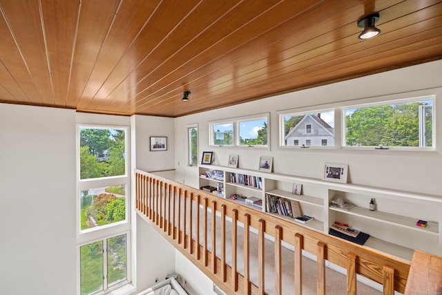 70 Prospect Hill Rd, Groton, CT 06340 - hallway featuring plenty of natural light and wood ceiling