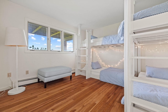 70 Prospect Hill Rd, Groton, CT 06340 - bedroom with hardwood / wood-style flooring and a baseboard radiator