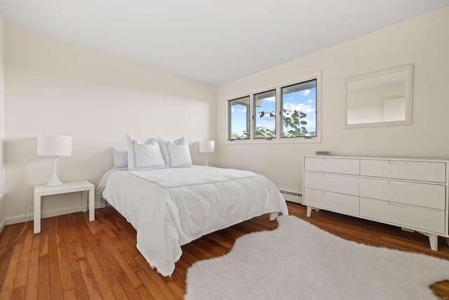 70 Prospect Hill Rd, Groton, CT 06340 - bedroom with wood finished floors and baseboard heating