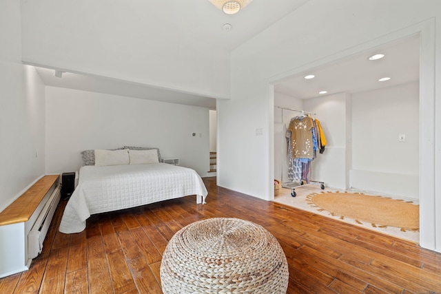 70 Prospect Hill Rd, Groton, CT 06340 - bedroom featuring wood-type flooring, a baseboard heating unit, recessed lighting, and a closet