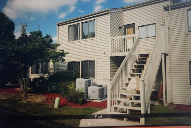 280 Brittany Farms Rd Apt C, New Britain, CT 06053 - rear view of house with stairway and cooling unit