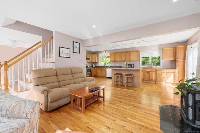 58 Snake Meadow Rd, Killingly, CT 06239 - living room with light wood finished floors, stairs, healthy amount of natural light, and recessed lighting
