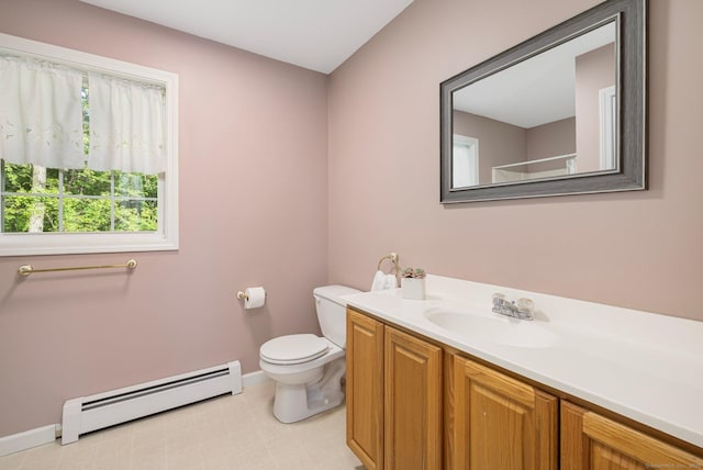 58 Snake Meadow Rd, Killingly, CT 06239 - bathroom featuring baseboard heating, toilet, baseboards, and vanity