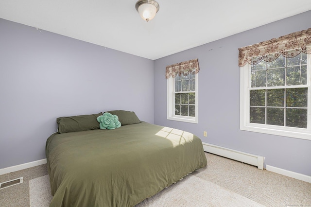 58 Snake Meadow Rd, Killingly, CT 06239 - carpeted bedroom featuring baseboard heating, multiple windows, and baseboards
