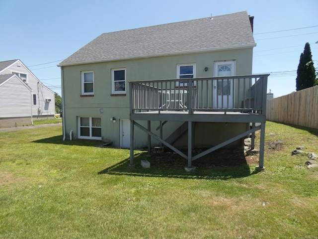 450 Thorme St, Bridgeport, CT 06606 - back of property with roof with shingles, a wooden deck, and stucco siding