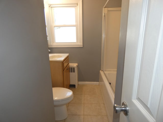 450 Thorme St, Bridgeport, CT 06606 - full bathroom with radiator, toilet, vanity, tile patterned flooring, and baseboards