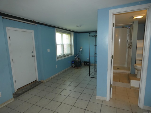450 Thorme St, Bridgeport, CT 06606 - foyer with light tile patterned floors and baseboards
