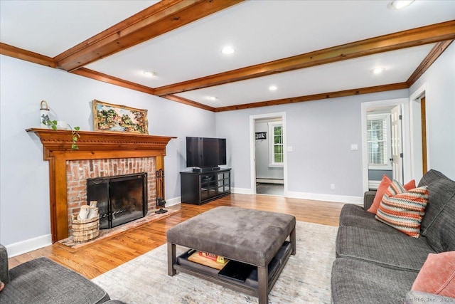 11 Wendover Rd, Newtown, CT 06470 - living area with a baseboard radiator, beam ceiling, wood finished floors, recessed lighting, and crown molding
