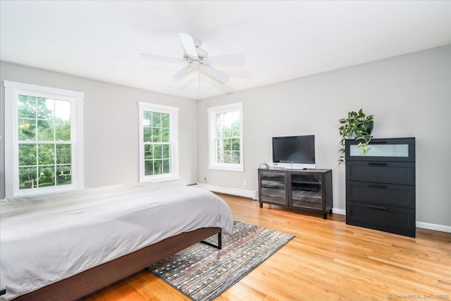 11 Wendover Rd, Newtown, CT 06470 - bedroom with a baseboard radiator, light wood-type flooring, baseboards, and a ceiling fan
