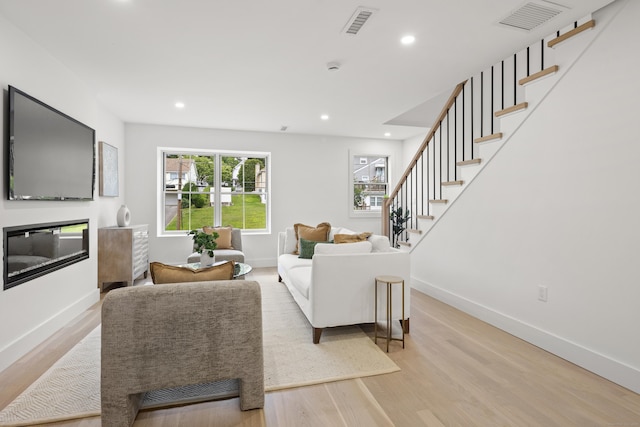 26 Homestead Ln Unit B, Greenwich, CT 06831 - living room featuring stairs, light wood-type flooring, baseboards, and recessed lighting