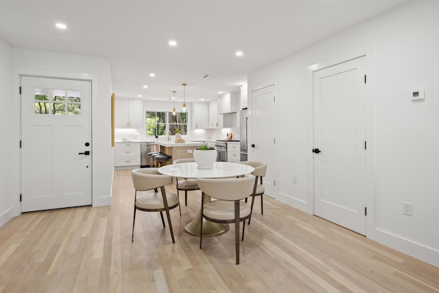 26 Homestead Ln Unit B, Greenwich, CT 06831 - dining room featuring light wood-style flooring, recessed lighting, and baseboards