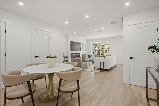 26 Homestead Ln Unit B, Greenwich, CT 06831 - dining area with light wood-style flooring and recessed lighting
